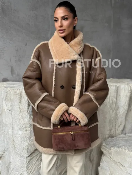 Коричневая женская дубленка - фото 0